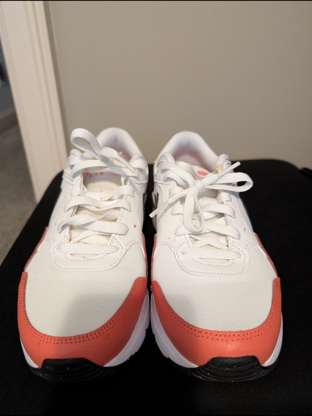 White Sneakers with Coral Accent